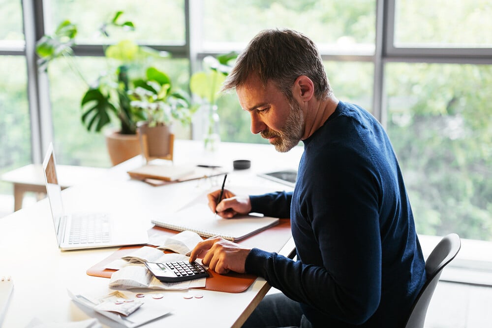 Person working on numbers for business